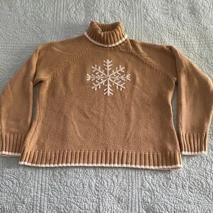 Cozy Tan Turtleneck Sweater with Snowflake Design